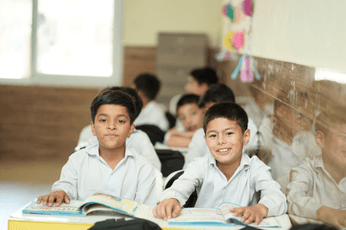 Students in a classroom at Pakistan Sweet Home