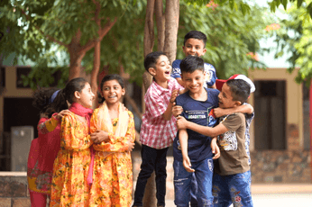 Children laughing and enjoying life at PSH