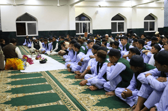 Children offering prayers at Pakistan Sweet Home