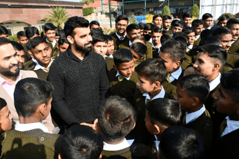 Children with cricketer Shadab Khan at PSH