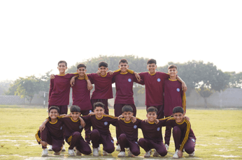 Children playing cricket at Pakistan Sweet Home