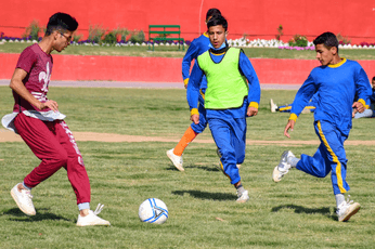 Team passing drill during sports activity at PSH