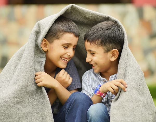 Children receiving Sadaqah support at Pakistan Sweet Home