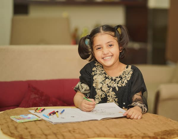 Children in a classroom built through Sadaqah Jariyah